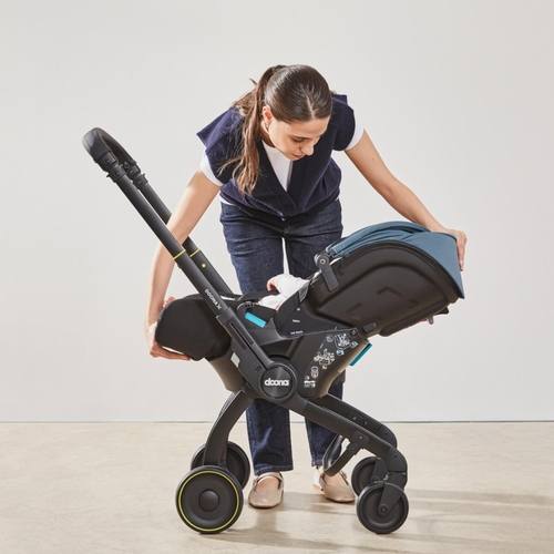 Seggiolino auto 2 in 1 Doona X — 3 posizioni reclinabili (seggiolino auto + passeggino) 