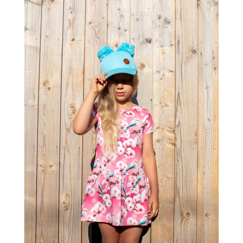 Double tuft girls` cap 